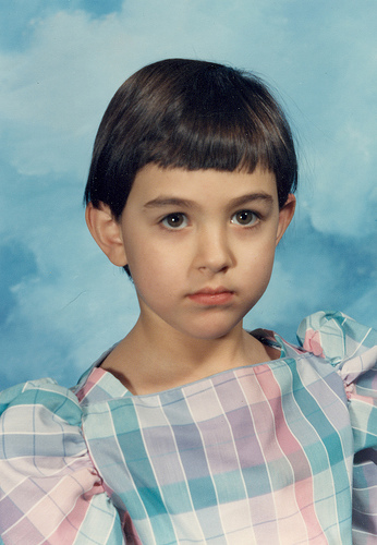 Illustration for article titled Goofy Glasses, Pretty Pigtails & Snaggletooth Smiles: September Is For School Portraits